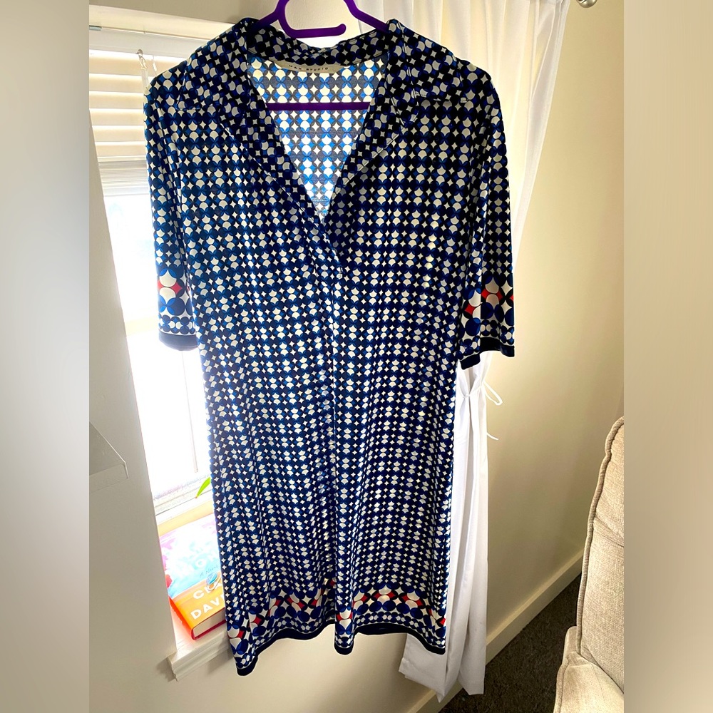 Navy dress with designs right above the knee